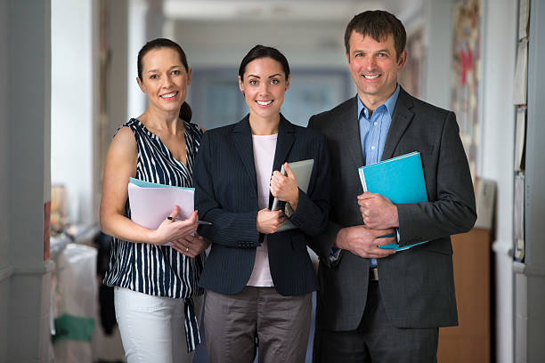 Group of teachers in a corridoor